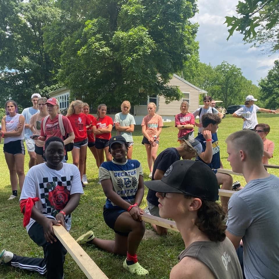 Teens gathered outdoors for a group activity